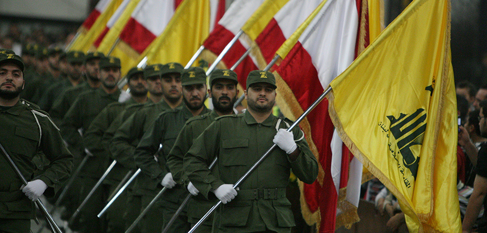 Hezbollah fighters in a ceremony; https://commons.wikimedia.org/wiki/File:Hezzzzbollah.jpgcc khamenei.ir, modified