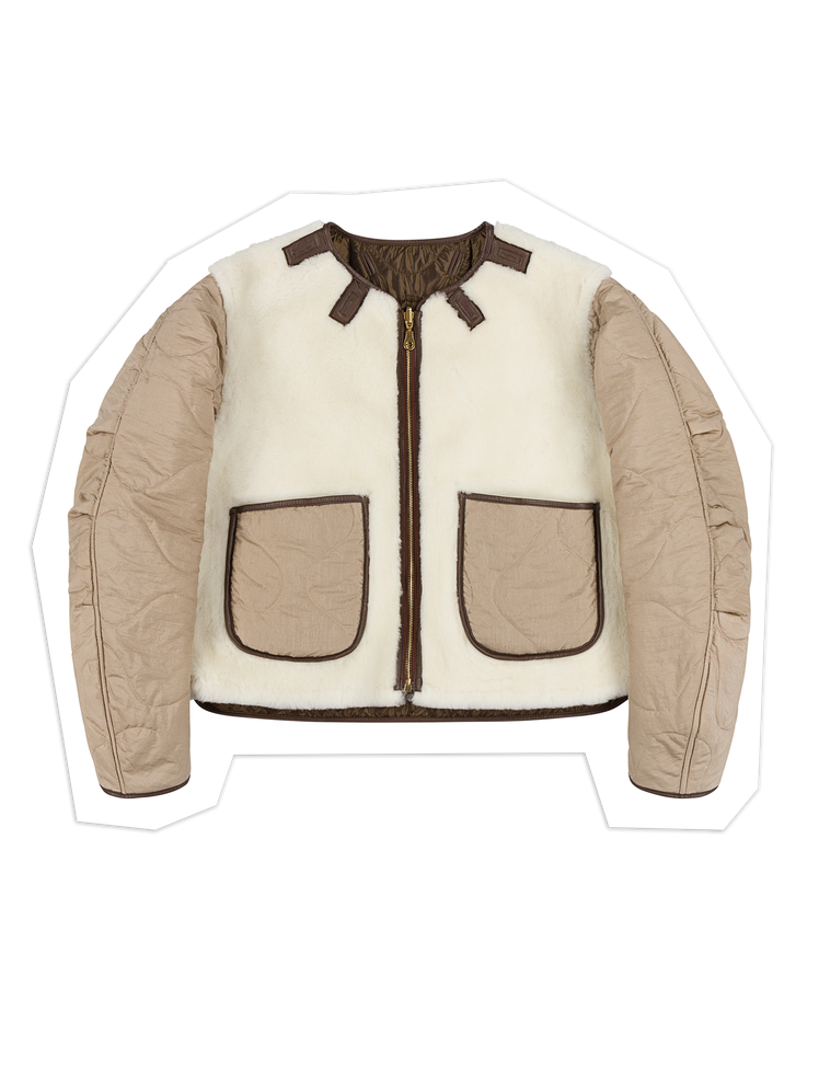 התמונה עשויה להכיל: בגדים, מעיל, מעיל ווסט