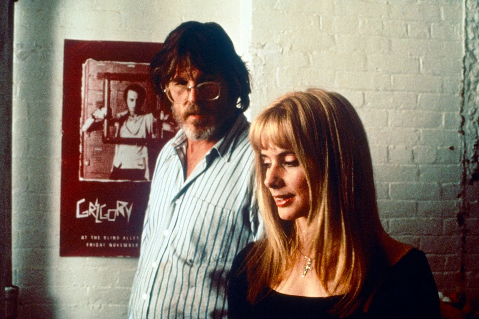 התמונה עשויה להכיל את Rosanna Arquette Nick Nolte אביזרים ותכשיטים לצילום פנים ראש אדם